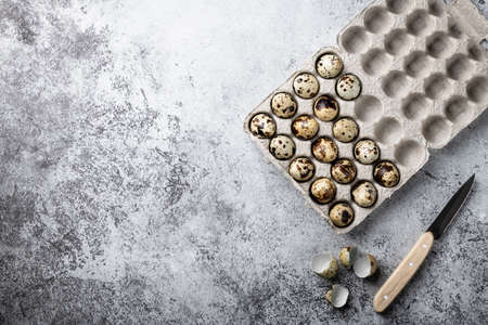 quail eggs in craft packaging. Top view, place for text.の写真素材