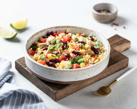 mexican quinoa bowl on a white backgroundの写真素材