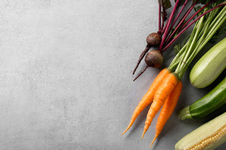 organic vegetables on light background, top view, copy space