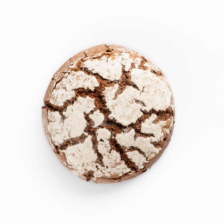 round rye bread on a white background, view from aboveの写真素材