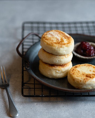 Cottage cheese pancakes with jam, homemade traditional syrniki, selective focusの写真素材