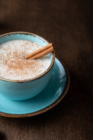 Turkish traditional hot drink salep on wooden background, selective focusの写真素材