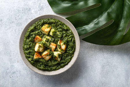 Palak Paneer indian traditional food on concrete background, top viewの写真素材