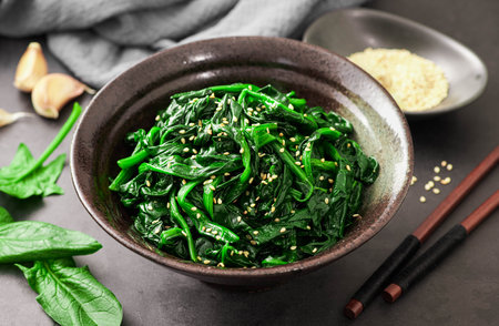 Sigeumchi Namul, Korean Spinach Salad, asian dish with sesame and garlic, selective focus