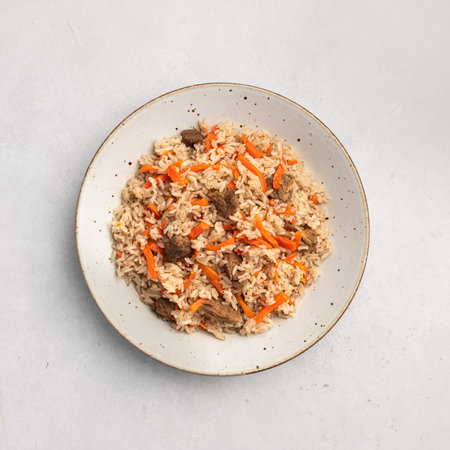 Pilaf, eastern dish of rice, meat, carrots with spices, top viewの写真素材