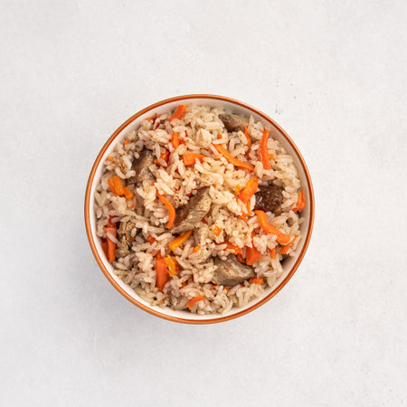 Pilaf, eastern dish of rice, meat, carrots with spices, top viewの写真素材