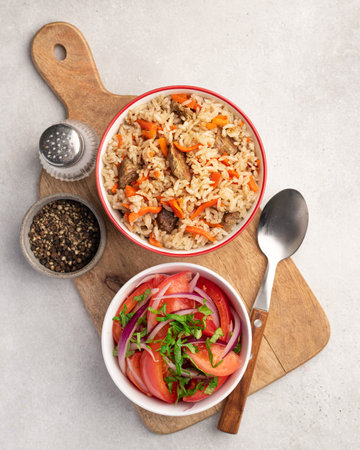 Pilaf, eastern dish of rice, meat, carrots with spices, top viewの写真素材