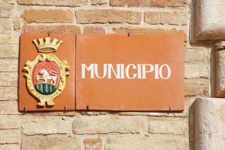 Terracotta plate of the town hall of Ripatransone, marche region in Italyの写真素材
