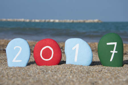 Happy New Year 2017 on colourful stonesの写真素材