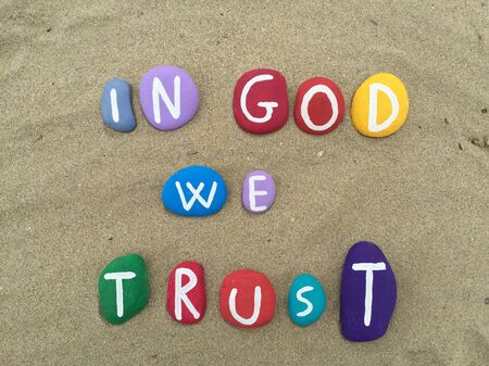 In God we trust, faith declaration on stonesの素材
