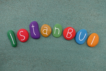 Istanbul, turkish name of the old Constantinople city with multicolored stones over green sandの写真素材