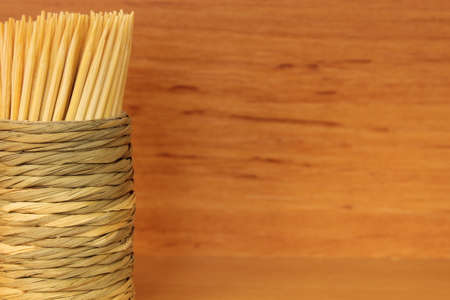 Wooden toothpicks on wooden in detail の写真素材