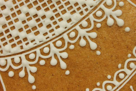 Decorated gingerbread with white pattern in detail