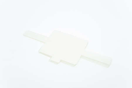 Top view of a pile of white thick papers for headband in eyelash extension treatment.の写真素材