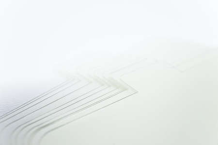 Close-up shot of a pile of white thick papers for headband in eyelash extension treatment.の写真素材