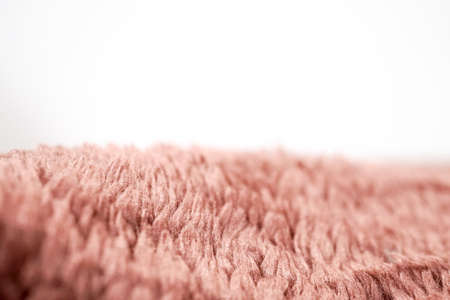 Close up shot of red brown fur towel or blanket with blur effects.の写真素材