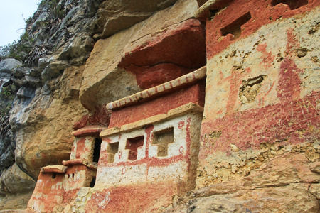 Pre inca mausoleum Revash in the mountains of northern Peru. Famous for the built in the wall and for the colorfull red and brown paintings.の写真素材