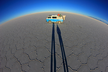 Van on Salar de Uyuni, salt lake, is largest salt flat in the world, altiplano, Bolivia, South America, fisheye perspectiveの写真素材