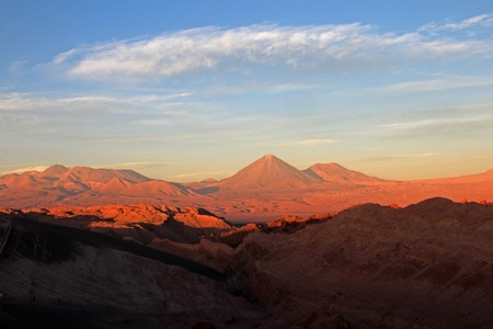 Valle de la Luna, valley of the moon, Volcan Lincancabur in the background, west of San Pedro, Atacama desert of Chileの写真素材