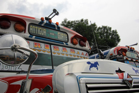 Typical colorful guatemalan chicken bus in Antigua, Guatemala, Central Americaのeditorial素材