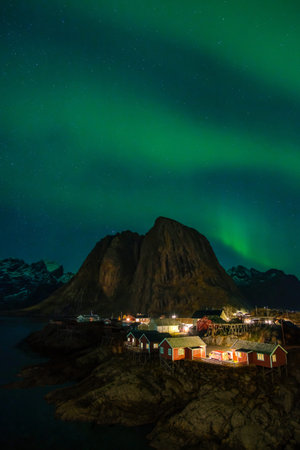 Northern Lights, Aurora Borealis, with classic view of Hamnoy, near Reine on Lofoten Islands, Norway, Scandinavia, Europeの写真素材