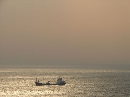 Ship in the misty morning on seaの写真素材