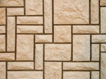 wall covered with stone tilesの写真素材