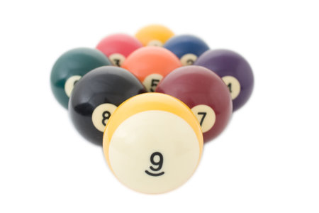 Nine billiard balls close up on white background