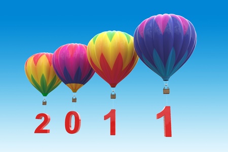 Colorful hot air balloons with red number 2011 on blue backgroundの写真素材