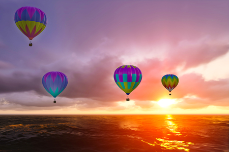 Colorful Hot Air Balloons over sea on sunsetの写真素材