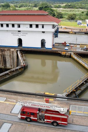 PANAMA â€“ SEPTEMBER 10. Fire truck controls the safety at Miraflores Locks on September 10,...