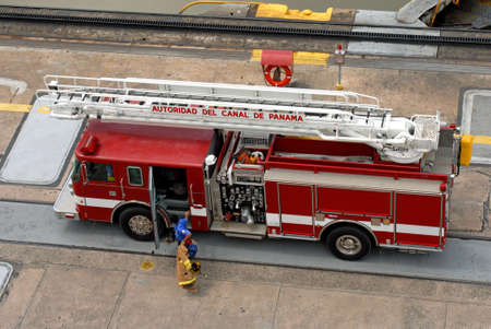 PANAMA  SEPTEMBER 10. Fire truck controls the Miraflores Locks safety at Panama Canal on September 10, 2006 in Panama. Six new locks will be constructed by 2015 on the Panama Canal.のeditorial素材