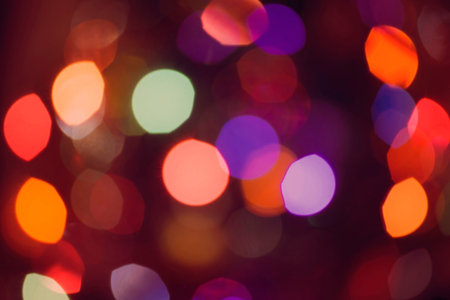 Abstract colorful blur light background with bokeh effect. Ideal for holiday greeting card, event...