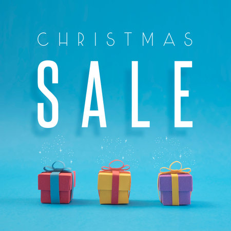 Christmas sale paper cut handmade gift boxes with sparkle elements illustration background. Ideal for winter season campaign, poster or web.の写真素材