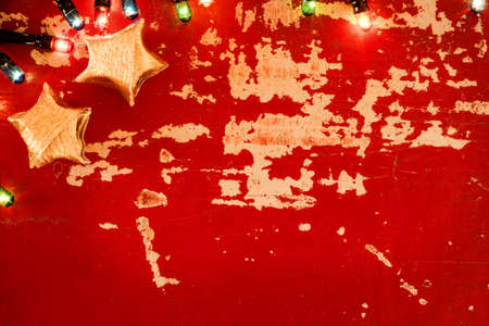 Holiday empty background concept template, vintage grunge wood texture with Christmas lights and decoration.の写真素材