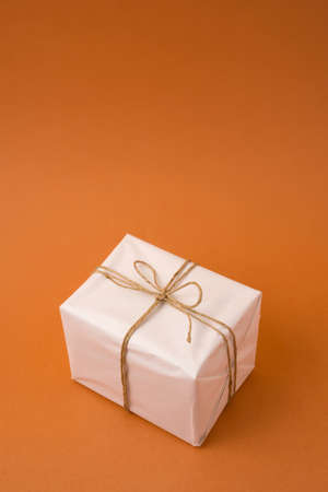 Simple gift box concept template on empty background with copy space. Ideal for sale or campaign.の写真素材