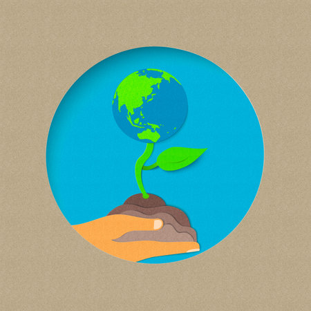 Earth day illustration for world environment care. Paper cut style plant growing from human hand. EPS10 vector.のイラスト素材