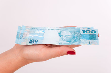 Brazilian money in the hands of a businesswoman