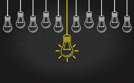 Light bulbs on a blackboard background. Creativity concept with innovation or inspiration in business, thinking outside the box.Strategy and leadership on teamwork. Opportunity, solution and success.のイラスト素材