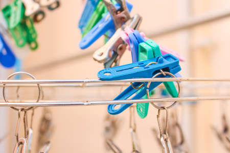 Row of Plastic Clothes pin clipの写真素材