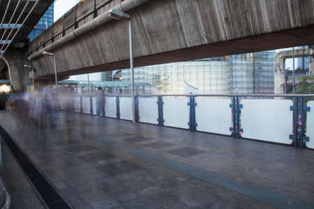 Busy skywalk in thailand, blurred peopleのeditorial素材