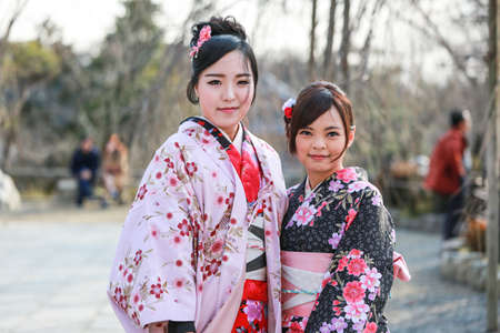 Kyoto, Japan - FEBUARY 10 2015: Pretty girl wearing Japanese kimono at Kiyomizu-dera Temple in Kyoto, Landmark of Japan.のeditorial素材