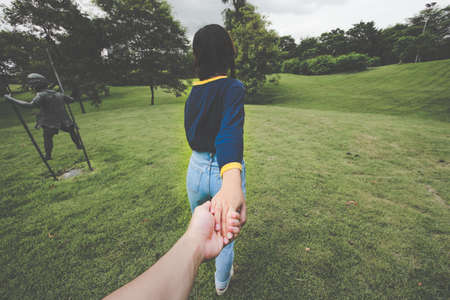 Hand Holding hand, Point of view.の写真素材