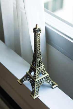Eifel Tower Model with white curtainの写真素材