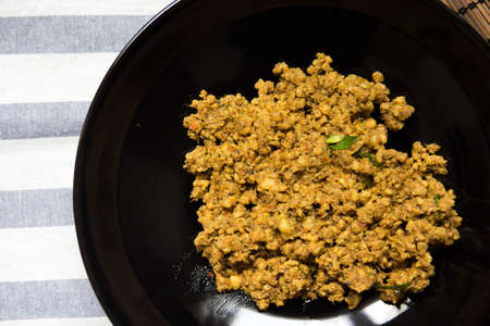 Pork yellow curry paste on a tableの写真素材