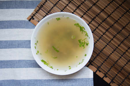 Top view of soup with wooden on backgroundの写真素材
