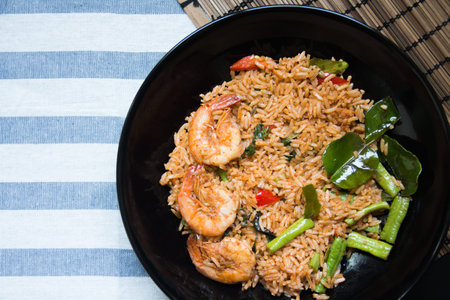 Red curry fried rice with prawnの写真素材