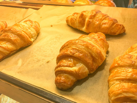 A croissants on the wooden shelf