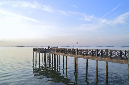 Waiting the ray of sunriseの写真素材