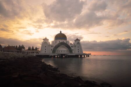 Waiting for ray of sunrise at Malacca Straits Mosque, Malaysiaの写真素材